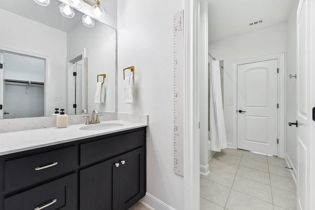 bathroom featuring vanity and tile patterned floors