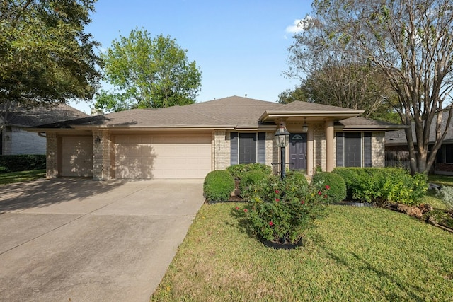 single story home with brick siding, an attached garage, driveway, and a front lawn