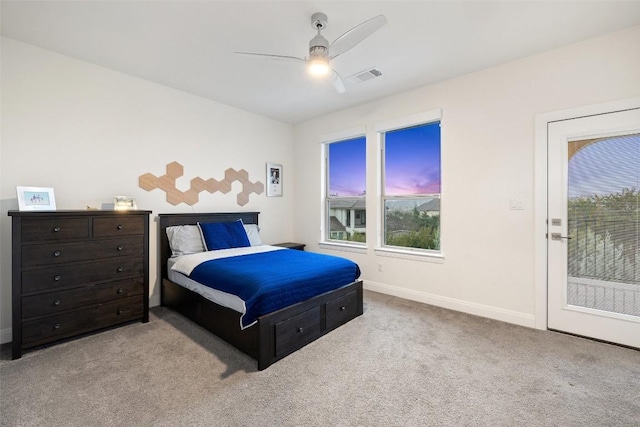 bedroom with light colored carpet, access to exterior, and ceiling fan