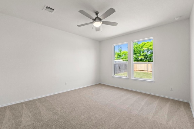 19216 Lady Bird Johnson St, Manor, TX 78653 - carpeted spare room featuring a ceiling fan and a smoke detector