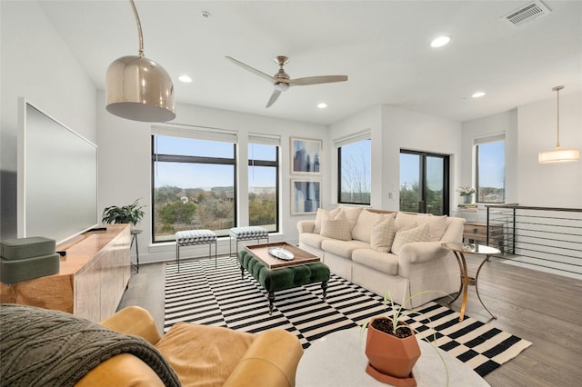 2050 Lohmans Spur Rd Unit 101, Lakeway, TX 78734 - living area featuring recessed lighting, ceiling fan, visible vents, and wood finished floors