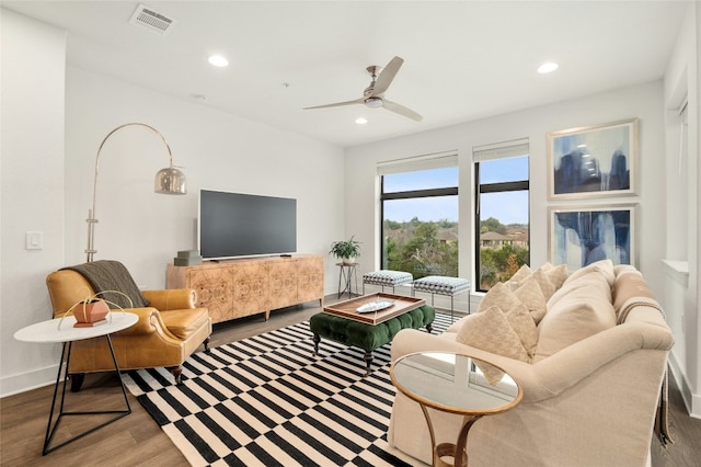 2050 Lohmans Spur Rd Unit 101, Lakeway, TX 78734 - living room with recessed lighting, baseboards, a ceiling fan, wood finished floors, and visible vents