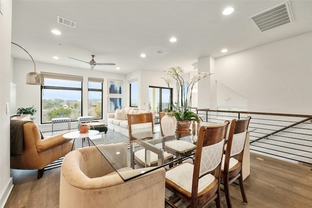 dining room featuring ceiling fan and dark hardwood / wood-style flooring