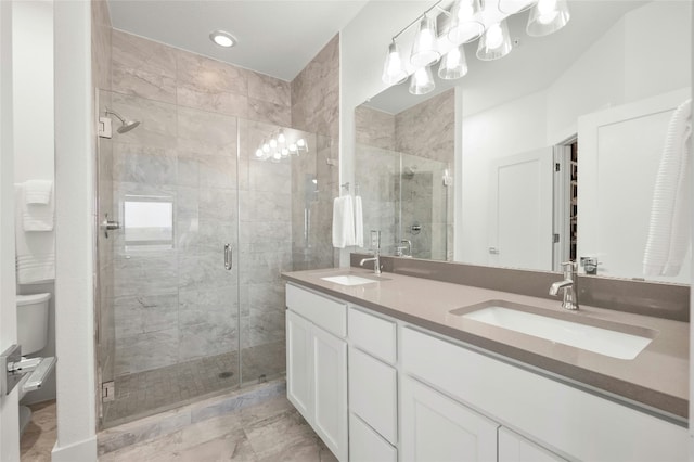 2050 Lohmans Spur Rd Unit 101, Lakeway, TX 78734 - bathroom featuring toilet, double vanity, a stall shower, and marble look tile flooring