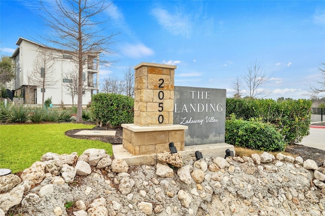 2050 Lohmans Spur Rd Unit 101, Lakeway, TX 78734 - community sign featuring a yard