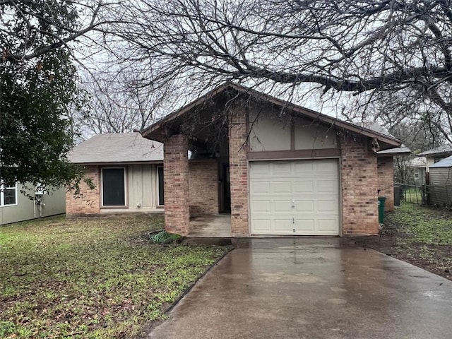 single story home with a garage and a front lawn