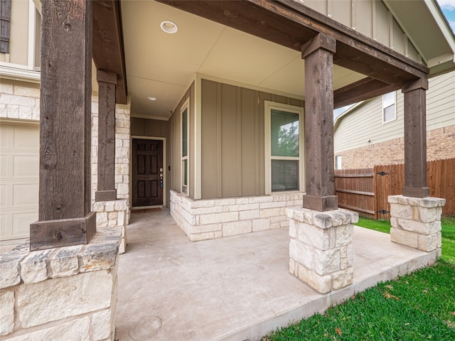 237 Andele Way, Liberty Hill, TX 78642 - doorway to property with board and batten siding