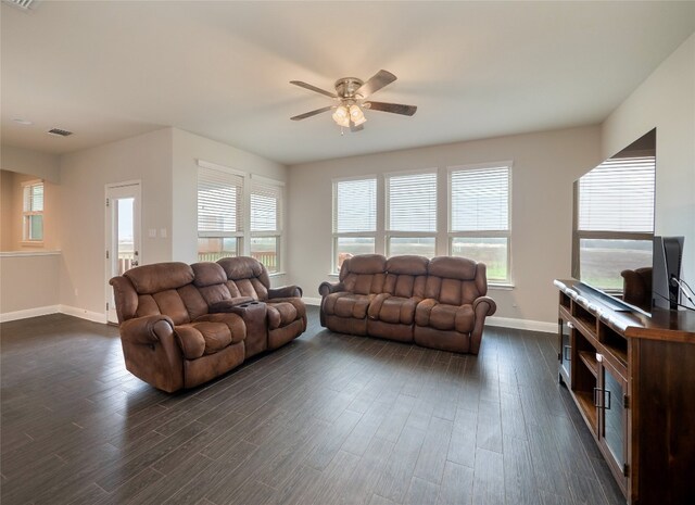 237 Andele Way, Liberty Hill, TX 78642 - living area featuring ceiling fan, baseboards, and dark wood-style floors