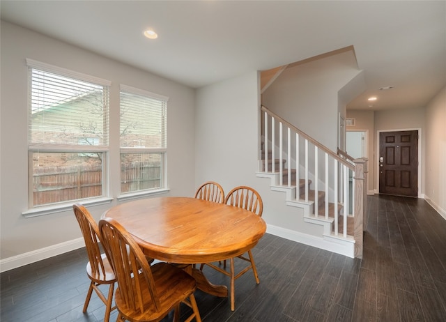 237 Andele Way, Liberty Hill, TX 78642 - dining room with baseboards, dark wood finished floors, recessed lighting, and stairway