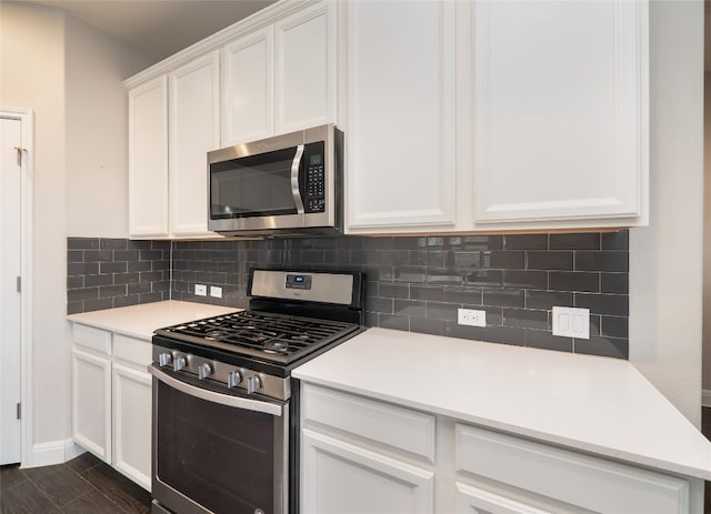 237 Andele Way, Liberty Hill, TX 78642 - kitchen with appliances with stainless steel finishes, decorative backsplash, light countertops, and white cabinets