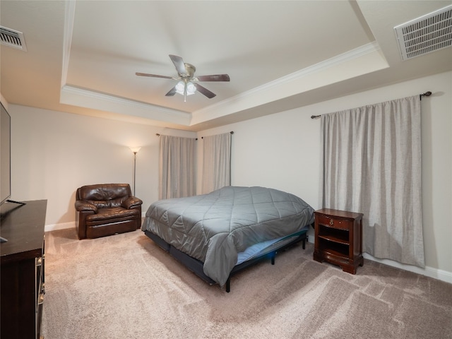 237 Andele Way, Liberty Hill, TX 78642 - carpeted bedroom featuring a tray ceiling, crown molding, a ceiling fan, and baseboards