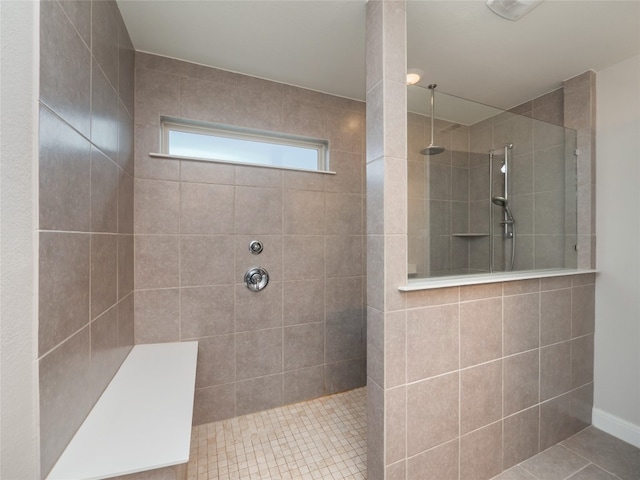 237 Andele Way, Liberty Hill, TX 78642 - bathroom featuring a walk in shower and tile patterned flooring
