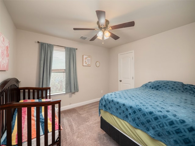 237 Andele Way, Liberty Hill, TX 78642 - carpeted bedroom with baseboards and a ceiling fan