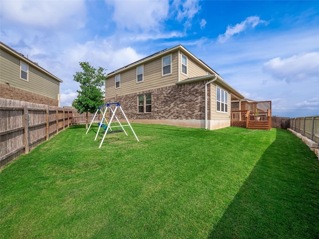 237 Andele Way, Liberty Hill, TX 78642 - rear view of property featuring brick siding and a wooden deck