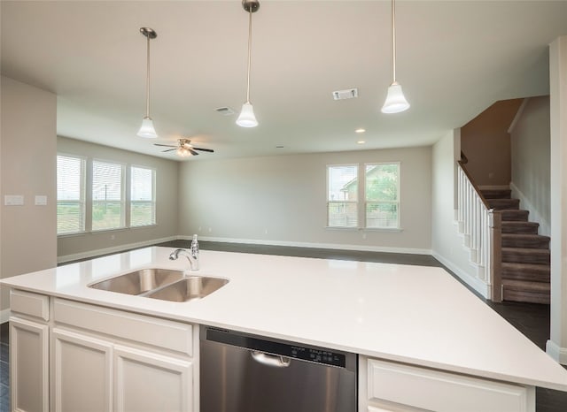 237 Andele Way, Liberty Hill, TX 78642 - kitchen with dishwasher, open floor plan, white cabinetry, and healthy amount of natural light
