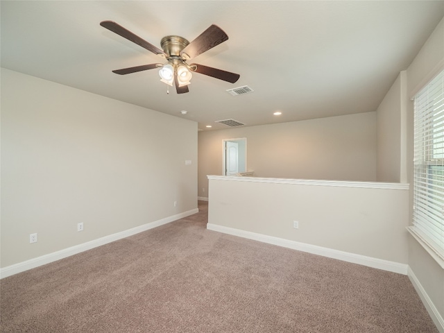 237 Andele Way, Liberty Hill, TX 78642 - empty room with light colored carpet, recessed lighting, and ceiling fan