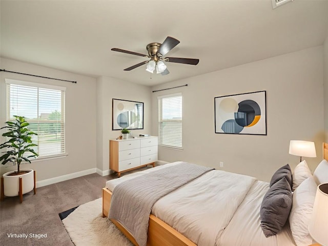 237 Andele Way, Liberty Hill, TX 78642 - carpeted bedroom with baseboards and a ceiling fan