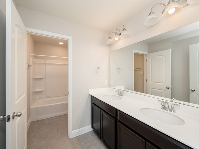 237 Andele Way, Liberty Hill, TX 78642 - bathroom featuring double vanity, tile patterned floors, and  shower combination