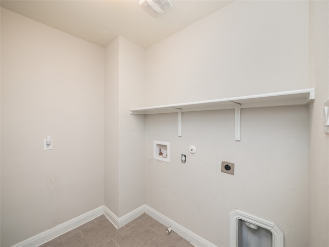 237 Andele Way, Liberty Hill, TX 78642 - laundry room with hookup for a gas dryer, electric dryer hookup, hookup for a washing machine, and light tile patterned floors