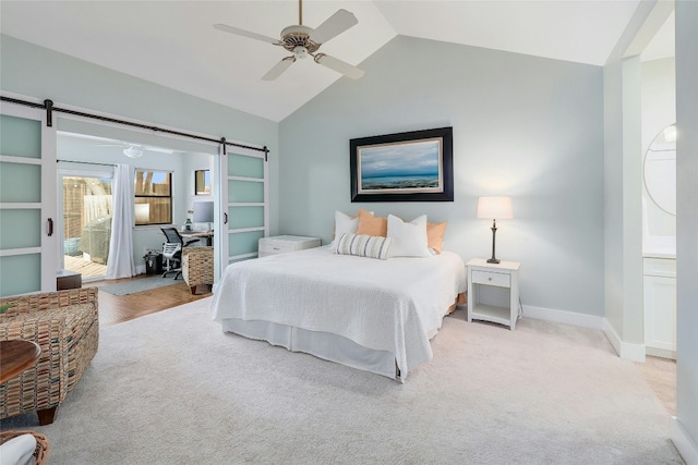 bedroom with a barn door, light carpet, lofted ceiling, and ceiling fan