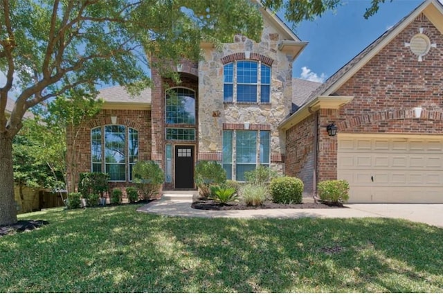 front facade with a garage and a front lawn