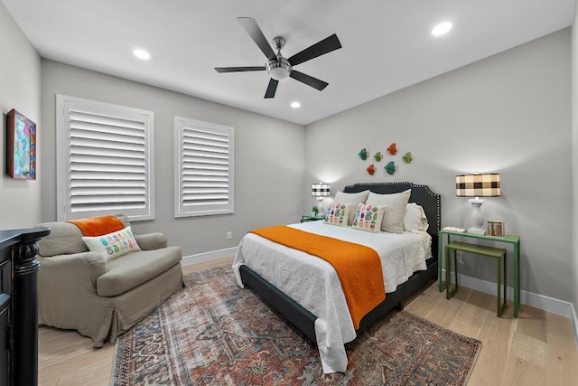 bedroom featuring hardwood / wood-style floors and ceiling fan