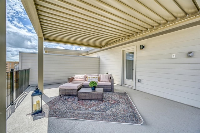 view of patio / terrace featuring an outdoor living space and a balcony