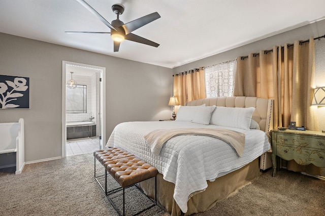 bedroom featuring carpet floors, connected bathroom, and ceiling fan