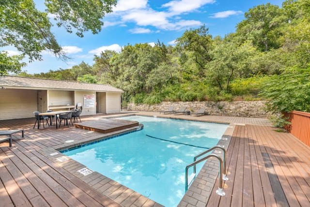 view of pool with a deck