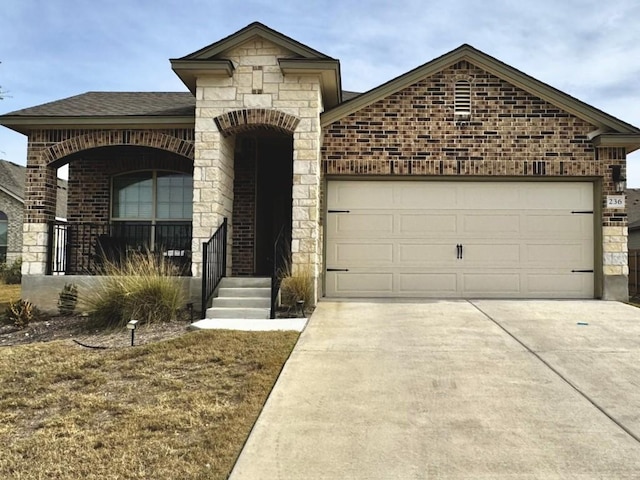 view of front of home with a garage