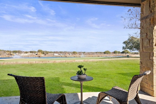 view of yard with a water view