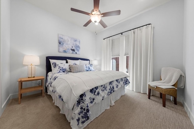 bedroom featuring light carpet and ceiling fan