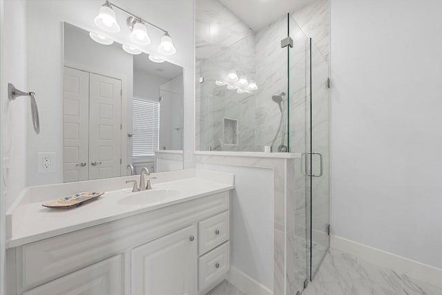 bathroom featuring vanity and a shower with shower door