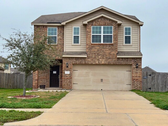 2709 Calypso Pl, Texas City, TX 77568 - traditional-style house with brick siding, a garage, driveway, and roof with shingles