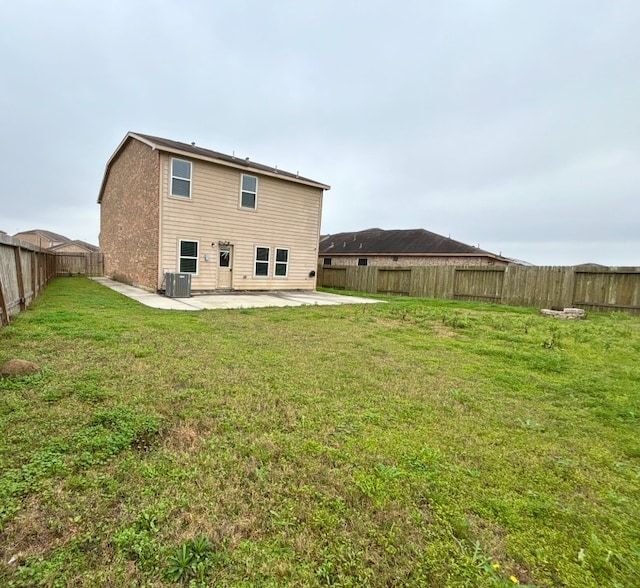 2709 Calypso Pl, Texas City, TX 77568 - rear view of property with a patio and central air condition unit