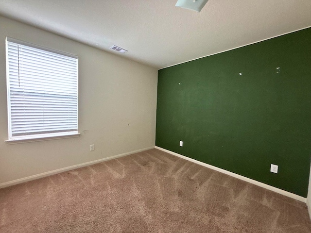 2709 Calypso Pl, Texas City, TX 77568 - spare room with carpet flooring and baseboards