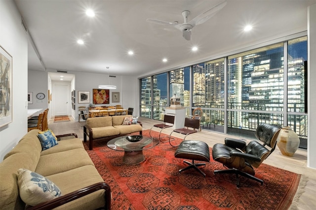 222 W Ave Unit 2201, Austin, TX 78701 - living area with expansive windows, plenty of natural light, recessed lighting, and a ceiling fan