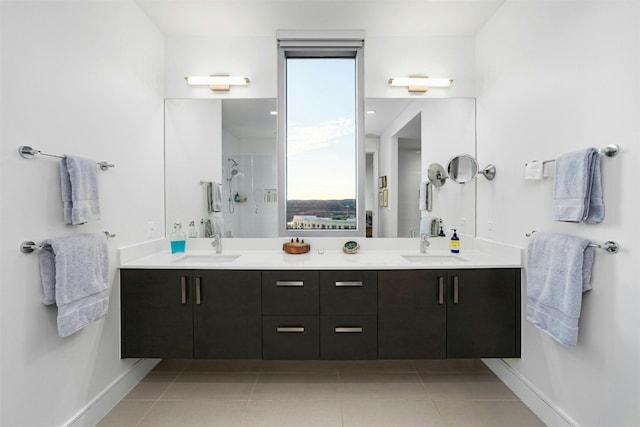 222 W Ave Unit 2201, Austin, TX 78701 - full bath with double vanity, a stall shower, tile patterned floors, and healthy amount of natural light