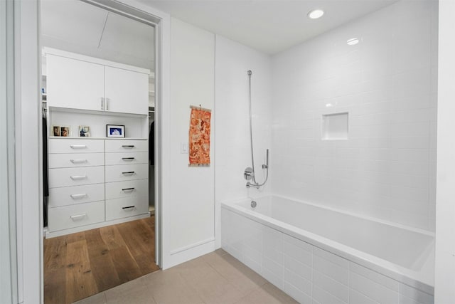 222 W Ave Unit 2201, Austin, TX 78701 - full bathroom featuring bathing tub / shower combination, tile patterned floors, and recessed lighting