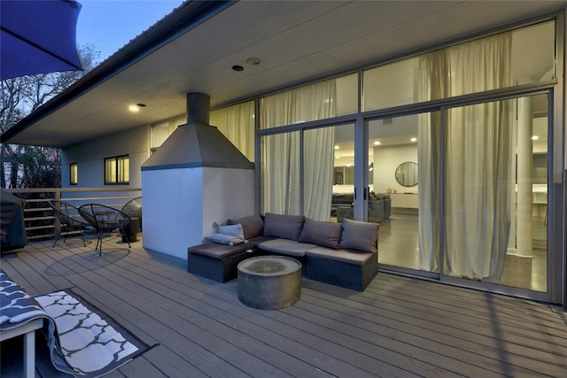 wooden deck featuring outdoor lounge area