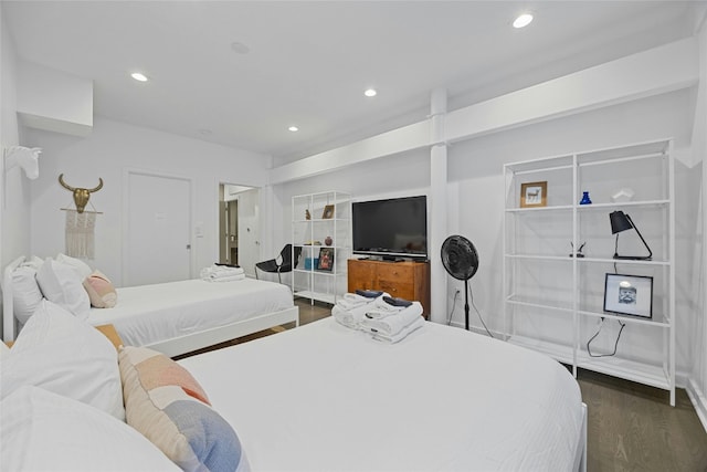 bedroom featuring dark hardwood / wood-style flooring