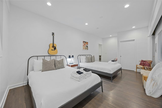 bedroom featuring dark hardwood / wood-style floors