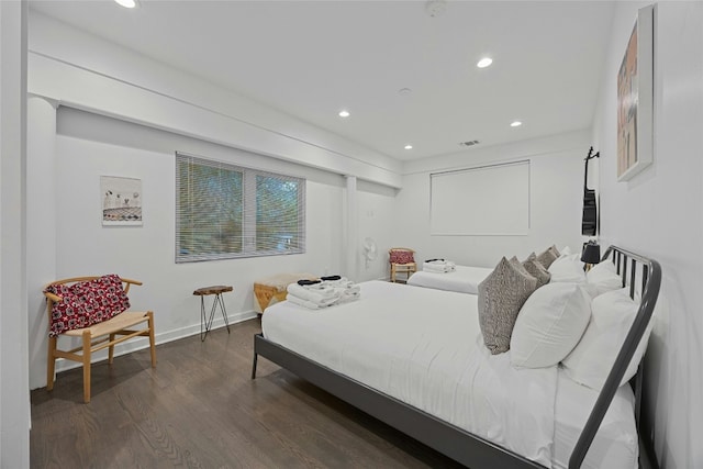 bedroom featuring dark hardwood / wood-style floors