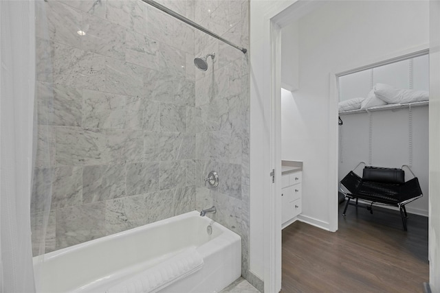 bathroom featuring shower / bathtub combination with curtain and wood-type flooring