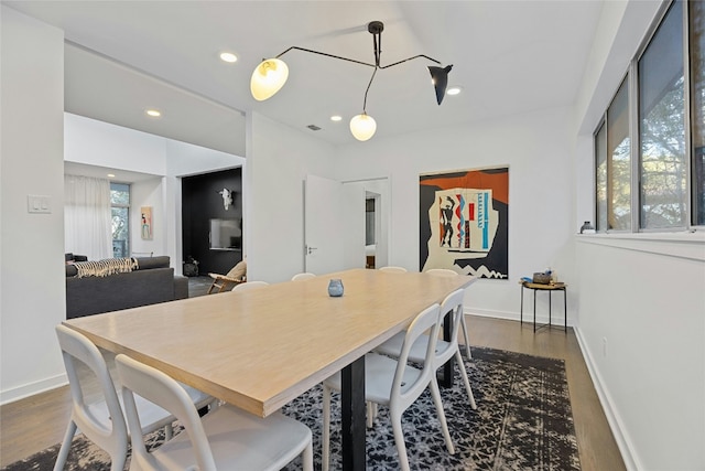 2909 Stratford Dr, Austin, TX 78746 - dining area featuring dark wood-style flooring and recessed lighting