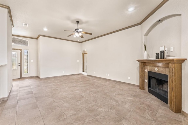 unfurnished living room with ornamental molding and ceiling fan