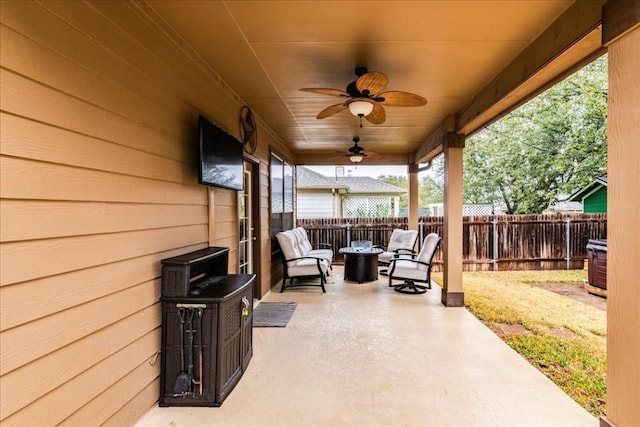 view of patio with ceiling fan