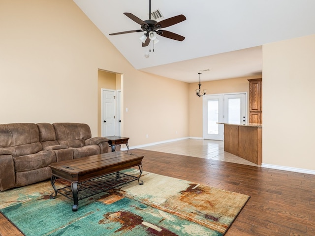 1504 County Road 459, Thorndale, TX 76577 - living area featuring a ceiling fan, wood finished floors, and high vaulted ceiling