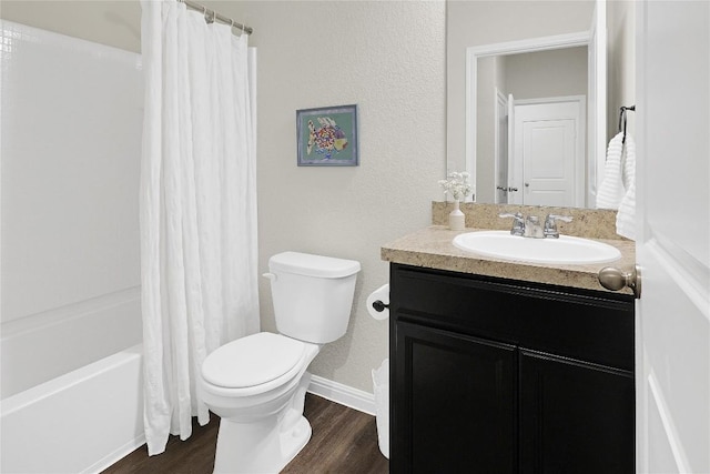 full bathroom featuring wood-type flooring, toilet, vanity, and shower / bath combo