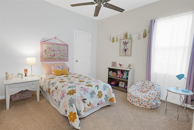 bedroom featuring ceiling fan and carpet floors